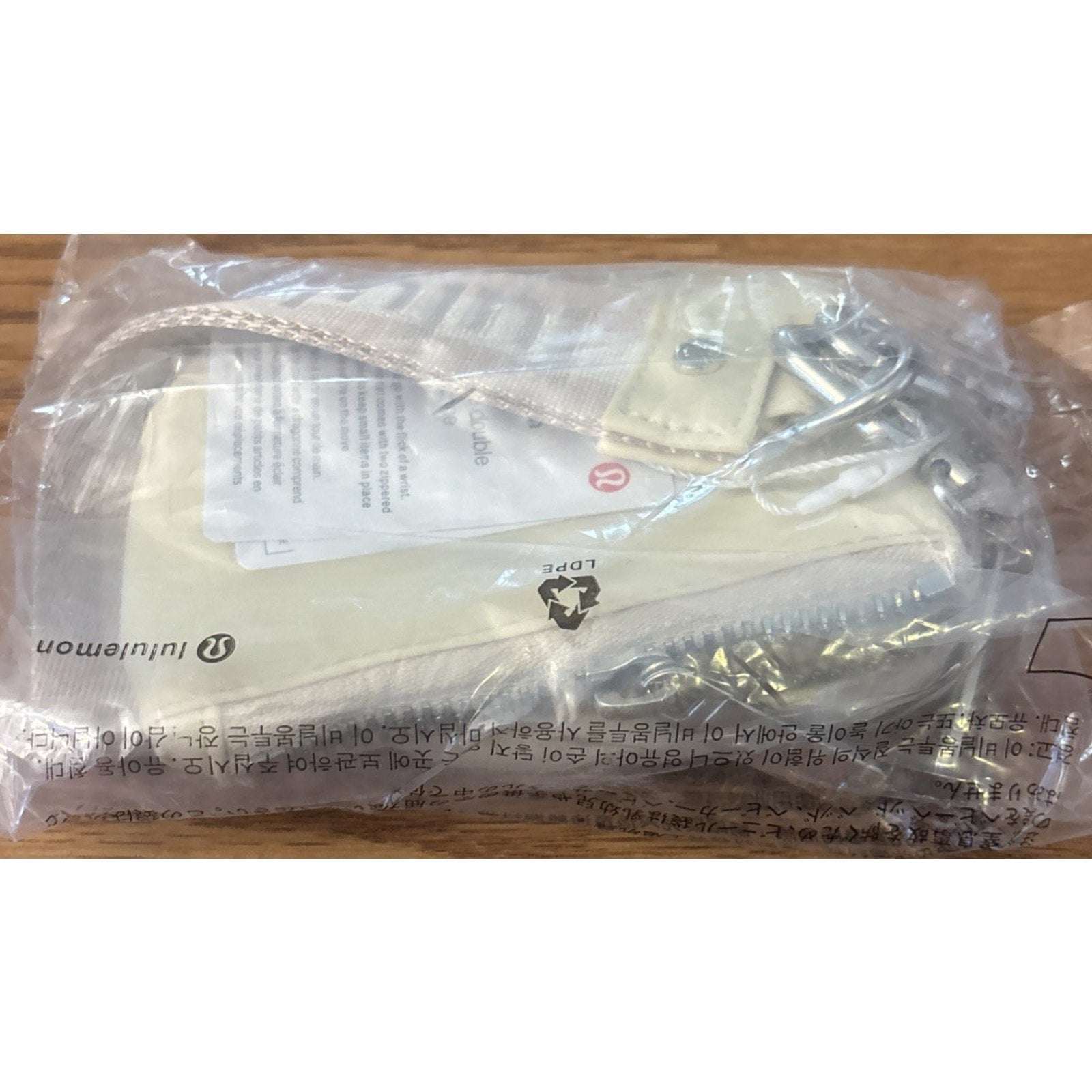 NWT Lululemon Dual Pouch Wristlet Wallet Keychain Wordmark Buttercream and Beige