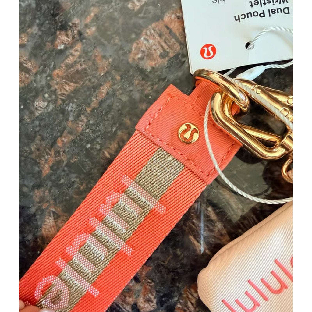 Lululemon Dual Pouch Wristlet Wordmark Melon/Peach, Light Pink with Gold