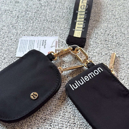 Lululemon Dual Pouch Wristlet Wallet Keychain Wordmark - Black and Gold