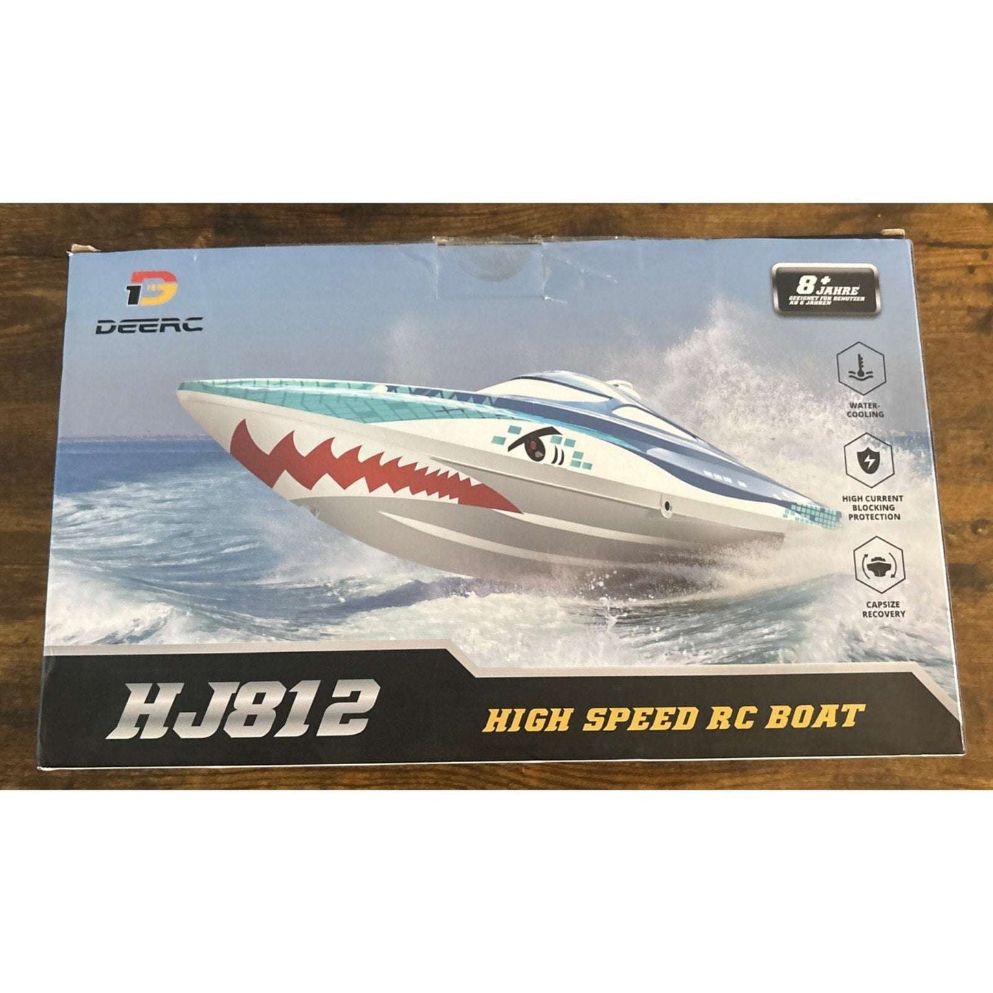 DEERC 2.4G RC Sink-Proof High Speed Racing Boat w/ LED Lights & Shark Graffiti