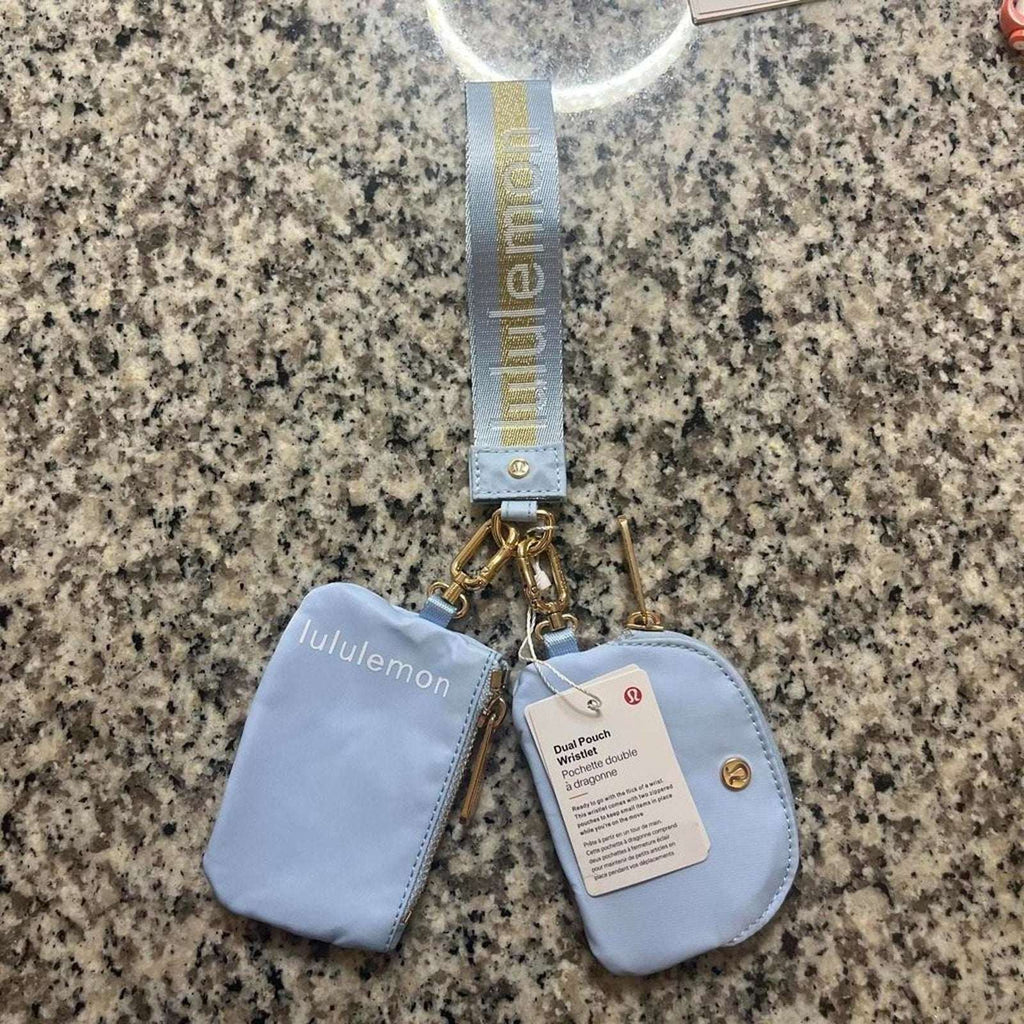 Lululemon Dual Pouch Wristlet Wordmark Dreamy Blue with Gold