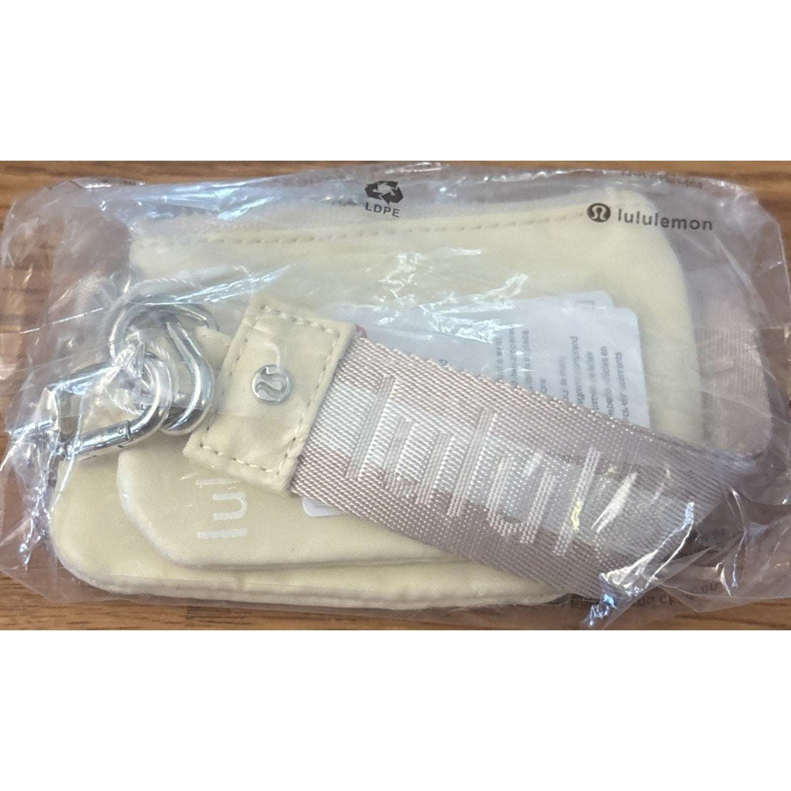 NWT Lululemon Dual Pouch Wristlet Wallet Keychain Wordmark Buttercream and Beige