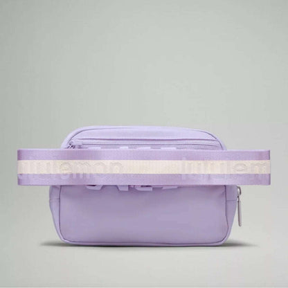 NWT Lululemon Everywhere Wordmark Crossbody Belt Bag 1L - Lilac Purple/Silver