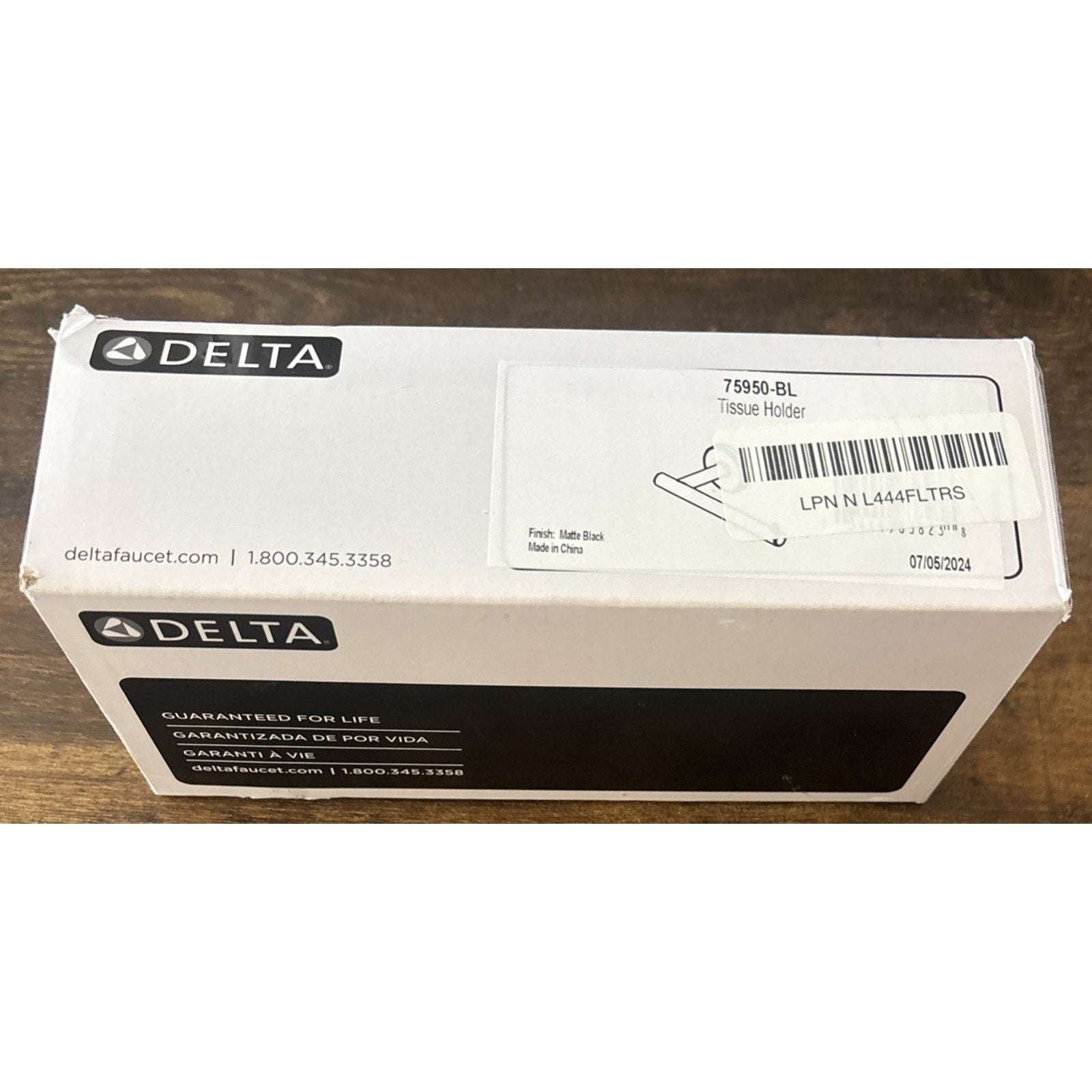 Delta 75950-BL Trinsic Single Bar Tissue Toilet Paper Roll Holder - Matte Black