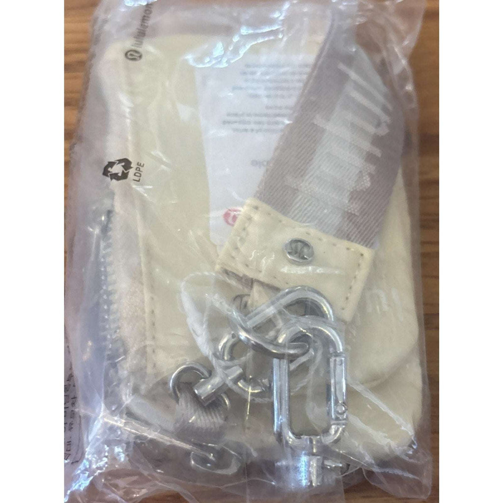 NWT Lululemon Dual Pouch Wristlet Wallet Keychain Wordmark Buttercream and Beige